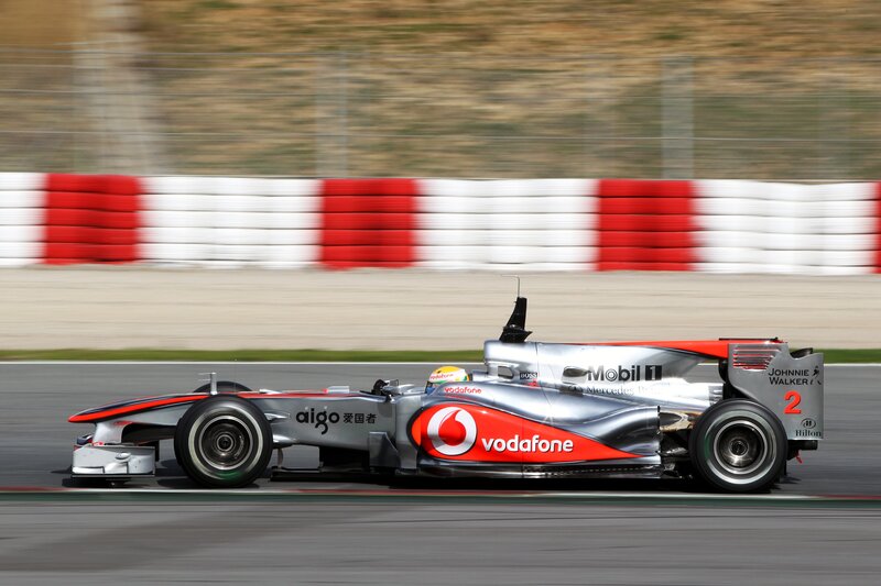 Formula One Car on Track — Silver, Dynamic, Afternoon, Photograph, Driver, Tire, Fence