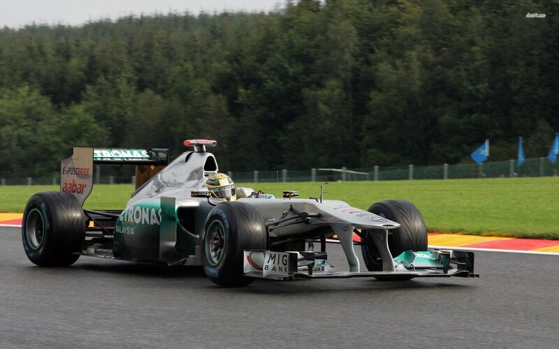 Formula One Car on Track — Silver, Dynamic, Afternoon, Photograph, Driver, Trees