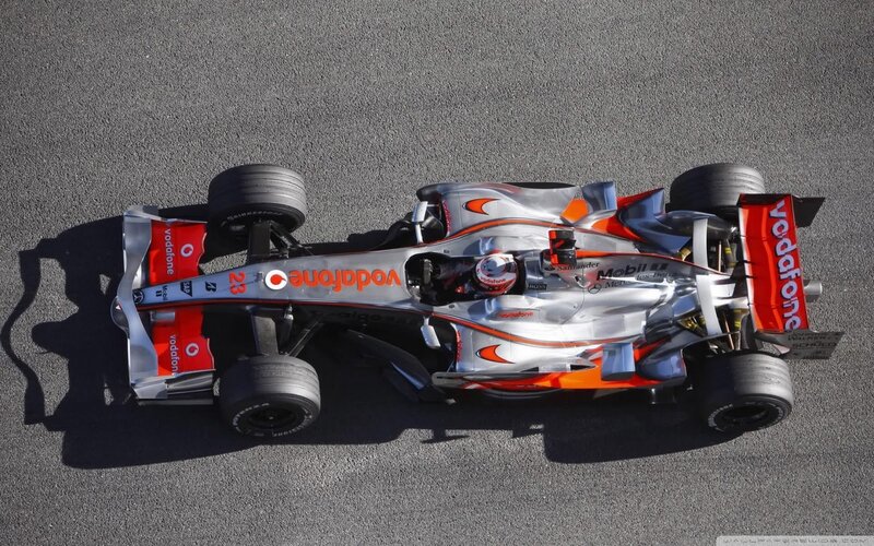 Formula One Car on Track — Silver, Dynamic, Afternoon, Photograph, Driver, Vodafone Logo, Mobil 1 Logo