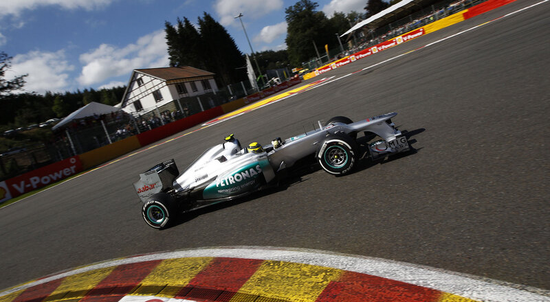Formula One Car on Track — Silver, Dynamic, Afternoon, Photograph, Race Car, Spectators