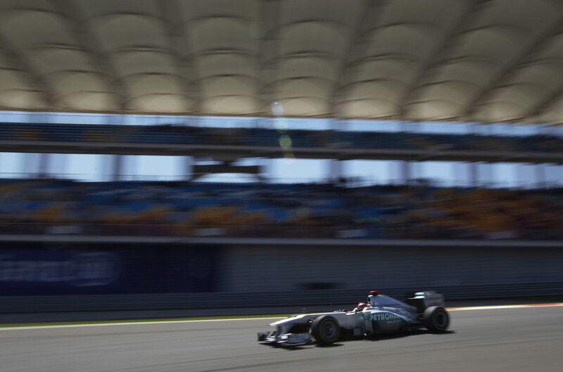 Formula One Car on Track — Silver, Dynamic, Afternoon, Photograph
