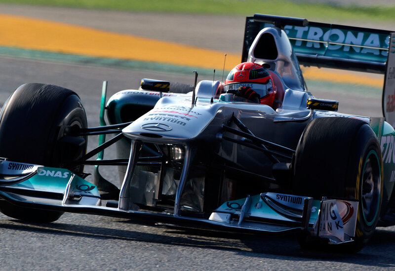 Formula One Car on Track — Silver, Dynamic, Afternoon