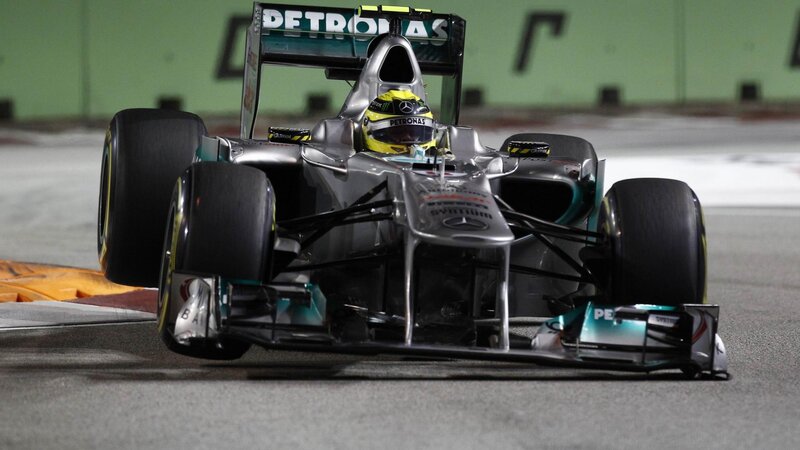 Formula One Car on Track — Silver, Dynamic, Night, Photograph, Driver, Race Car