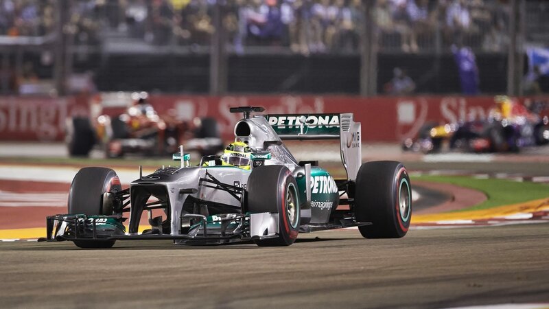 Formula One Car on Track — Silver, Dynamic, Night, Photograph, Driver, Race Track