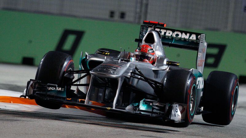 Formula One Car on Track — Silver, Dynamic, Night
