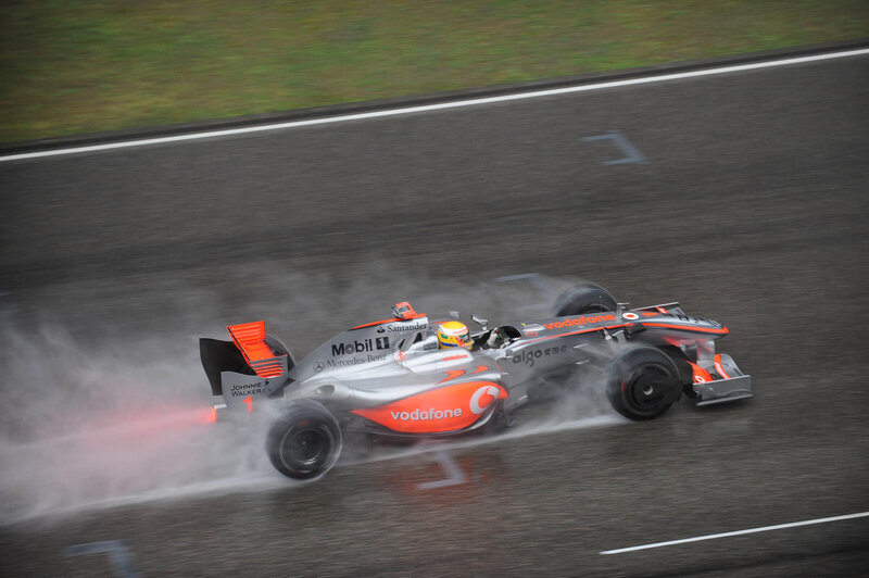 Formula One Car on Track — Silver, Dynamic, Photograph, Driver, Race Car, Tire Smoke