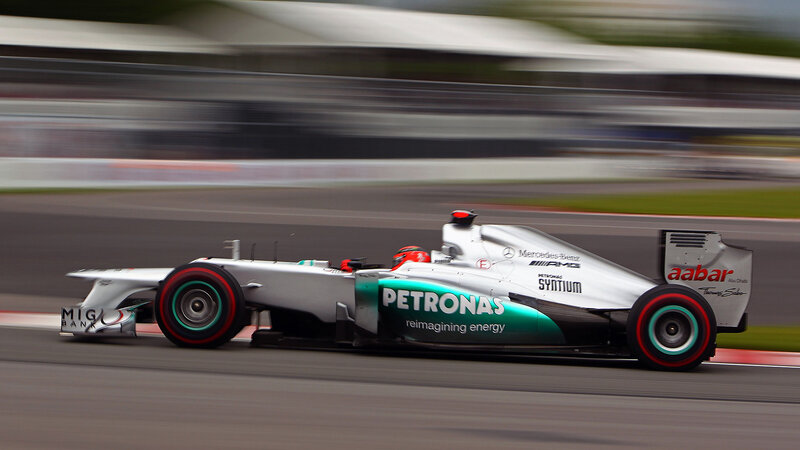 Formula One Car on Track — Silver, Dynamic, Photograph, Driver, Race Track