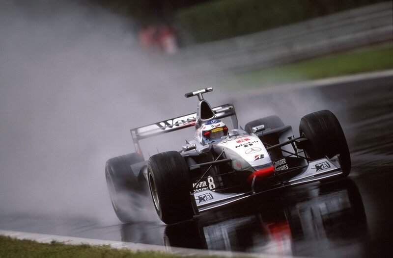 Formula One Car on Track — Silver, Dynamic, Photograph, Driver, Smoke