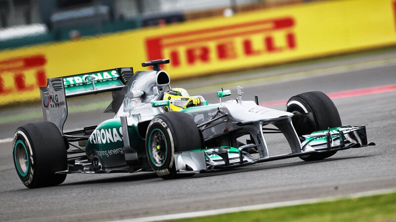 Formula One Car on Track — Silver, Dynamic, Photograph, Driver, Tire