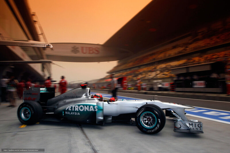 Formula One Car on Track — Silver, Dynamic, Sunset