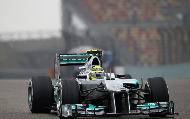 Formula One Car on Track — Silver, Focused, Photograph, Driver
