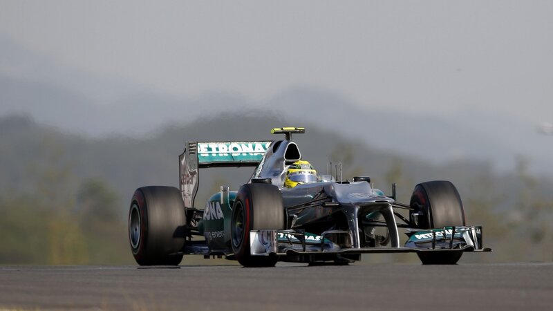 Formula One Car on Track — Silver, Focused