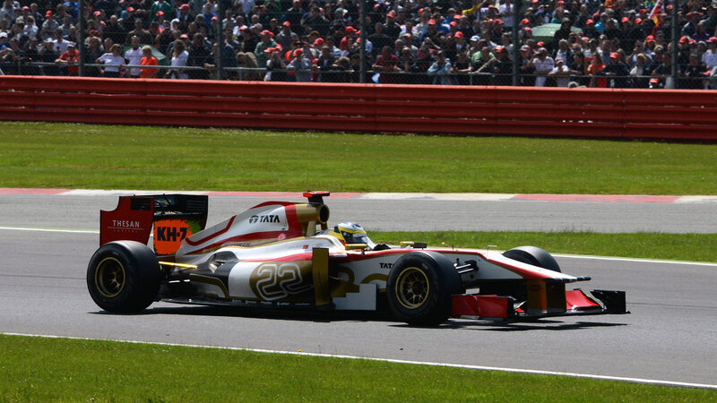 Formula One Car on Track — White, Active, Afternoon, Photograph, Crowd