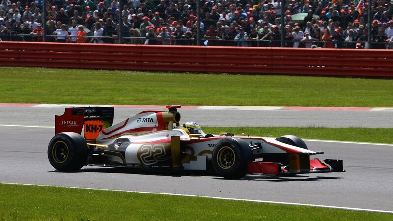 Formula One Car on Track — White, Active, Afternoon, Photograph, Driver