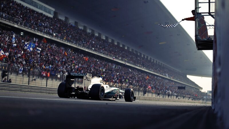 Formula One Car on Track — White, Dramatic, Afternoon