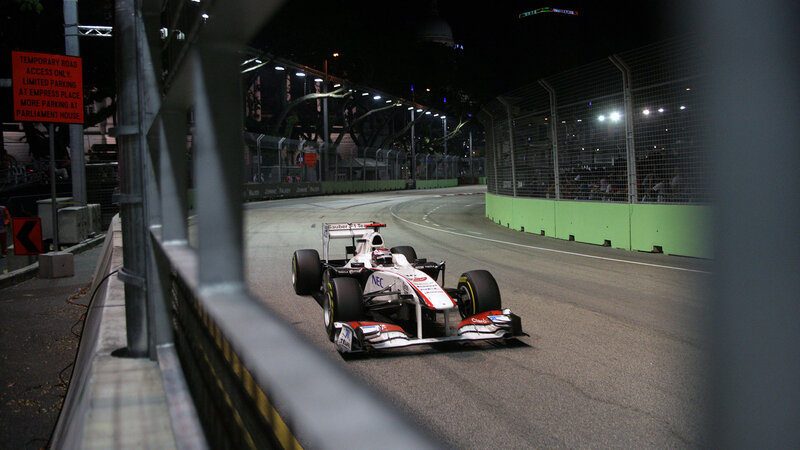 Formula One Car on Track — White, Dramatic, Night