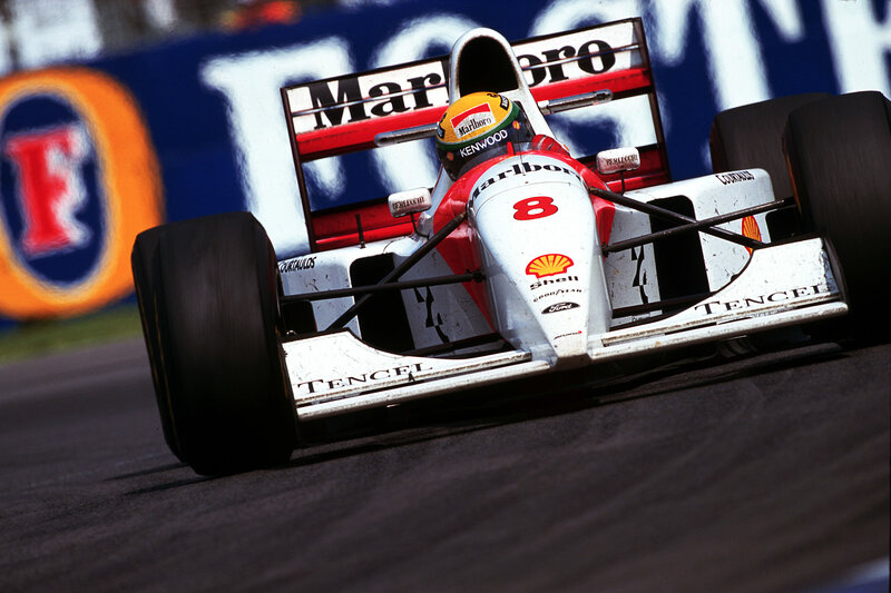 Formula One Car on Track — White, Dynamic, Afternoon, Photograph, Driver, Racing Car, Sponsor Logos