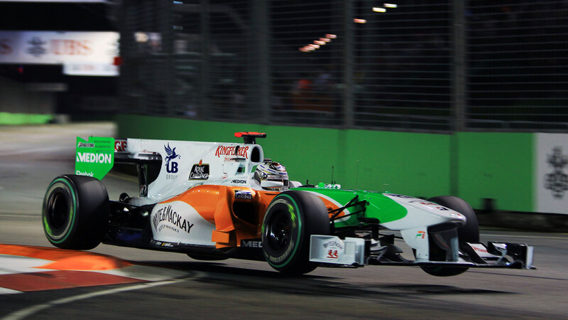 Formula One Car on Track — White, Dynamic, Night
