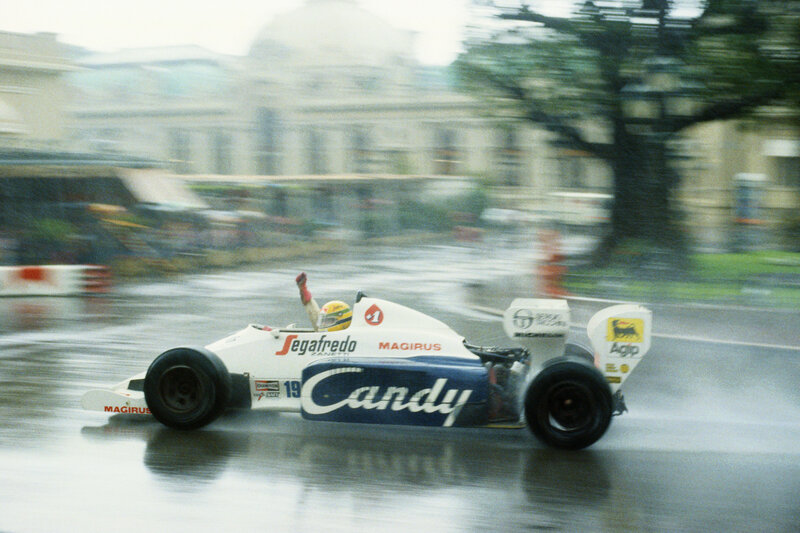 Formula One Car on Track — White, Dynamic, Photograph, Driver, Race Car, Wet Pavement