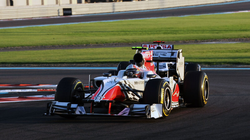 Formula One Car on Track — White, Dynamic, Sunset
