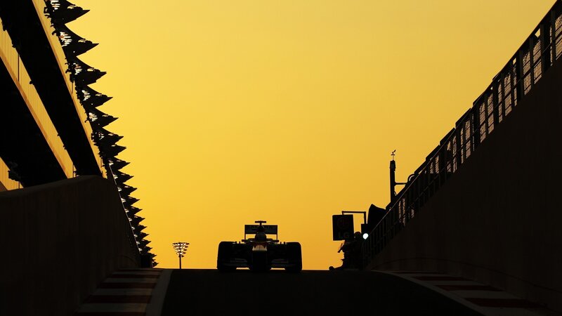 Formula One Car on Track — Yellow, Dramatic