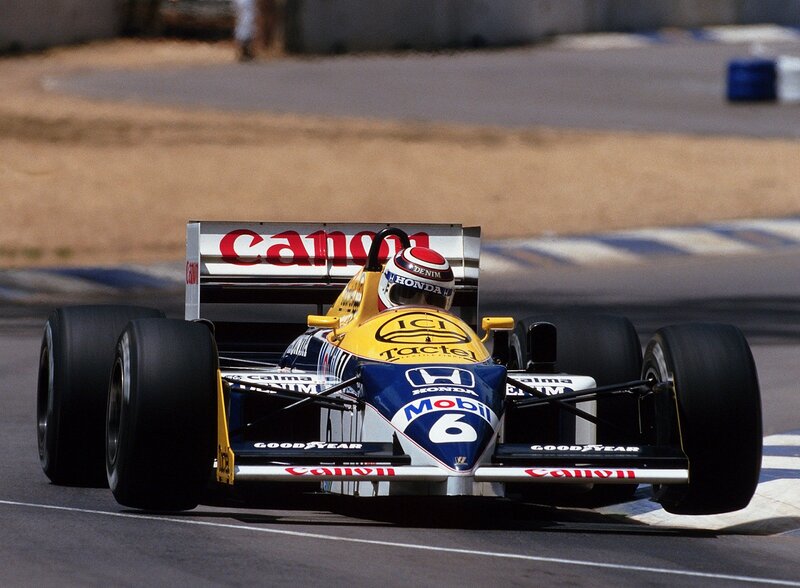 Formula One Car on Track — Yellow, Dynamic, Afternoon, Photograph, Driver, Racing Car, Blue, Black