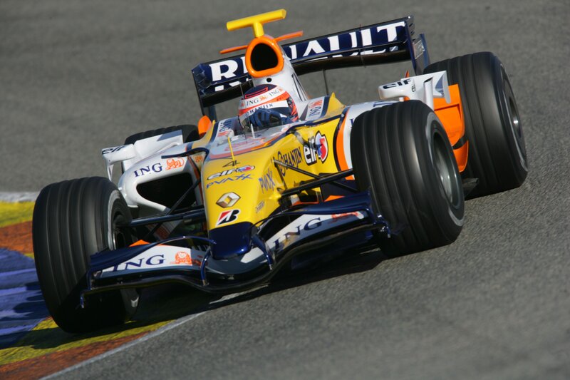 Formula One Car on Track — Yellow, Dynamic, Afternoon, Photograph, Driver, Racing Car, Blue, White