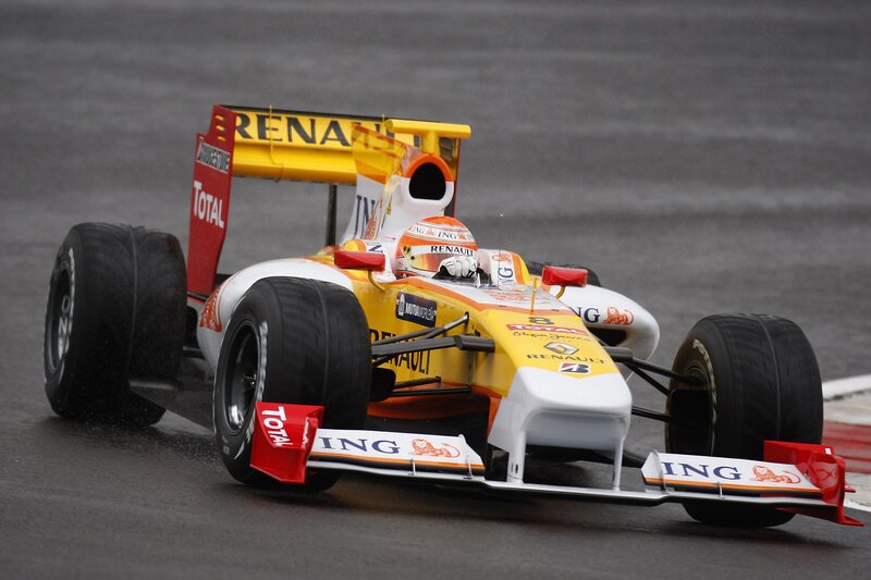 Formula One Car on Track — Yellow, Dynamic, Photograph, Driver