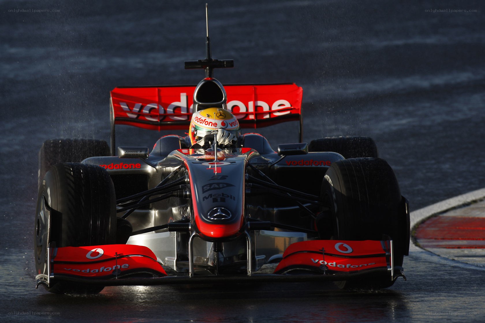 Formula One car on wet track