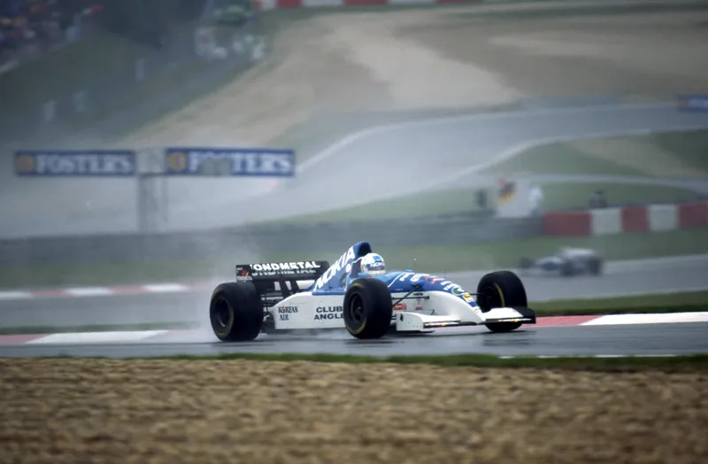 Formula One car on wet track