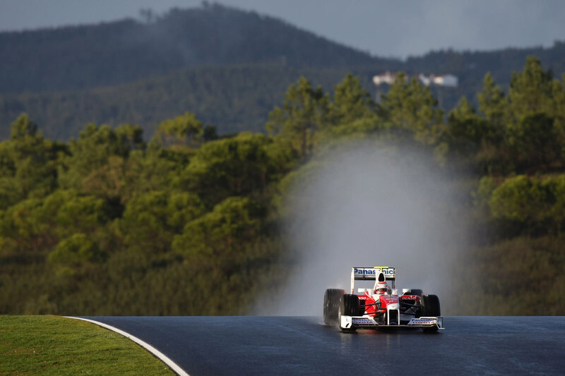 Formula One car on wet track