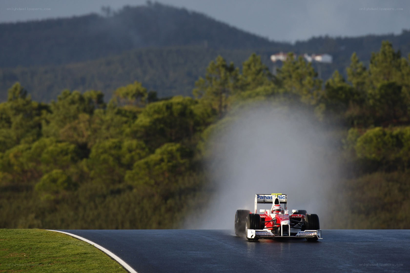 Formula One car on wet track