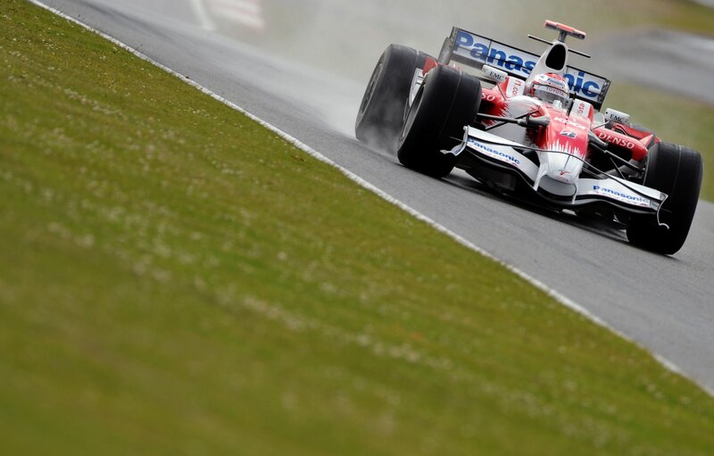 Formula One car on wet track