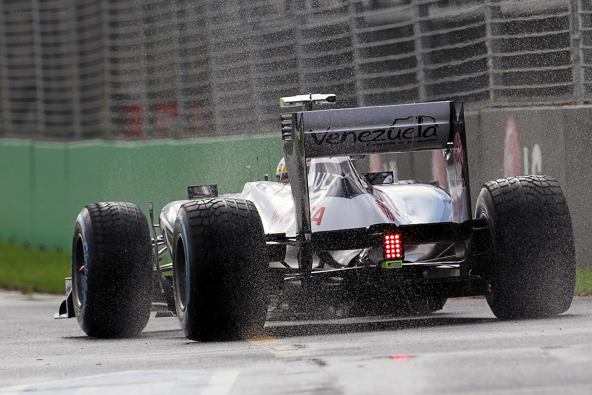 Formula One car on wet track
