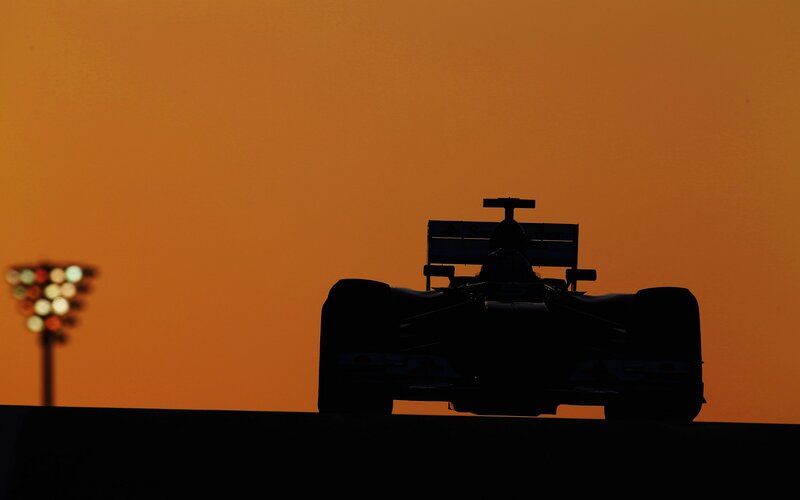 Formula One Car Silhouette — Orange, Dramatic