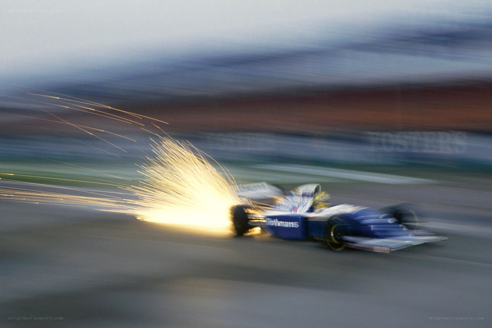 Formula One car sparks on track