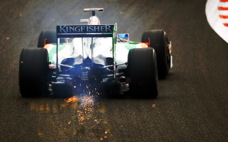 Formula One car sparks on track