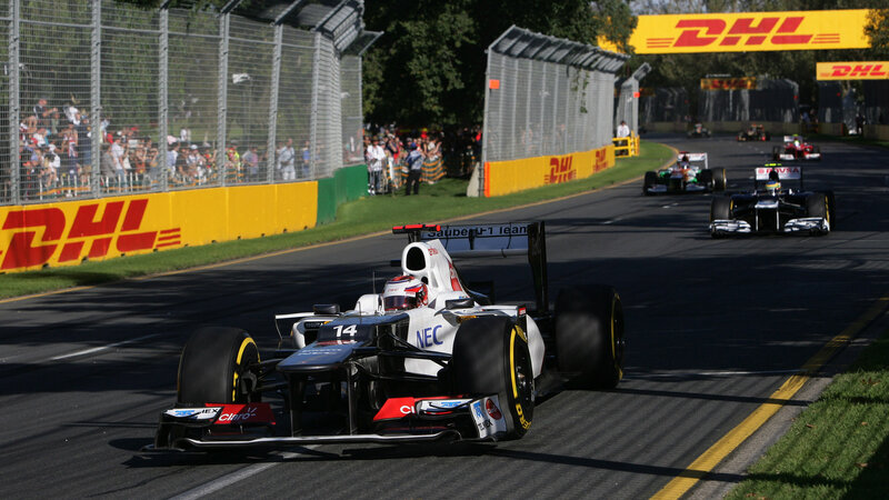 Formula One Cars on Track — Black, Competitive, Afternoon