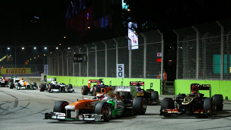 Formula One Cars on Track — Black, Competitive, Night