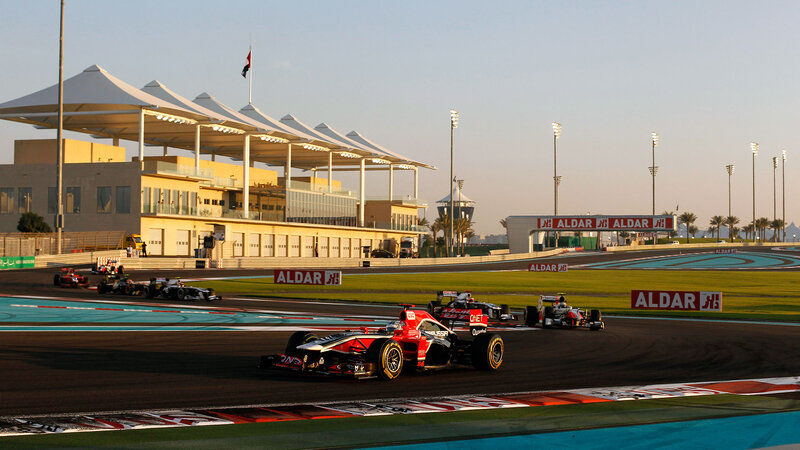 Formula One Cars on Track — Black, Dynamic, Sunset, Photograph