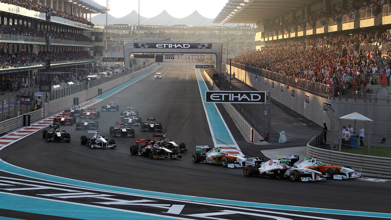 Formula One Cars on Track — Black, Dynamic, Sunset
