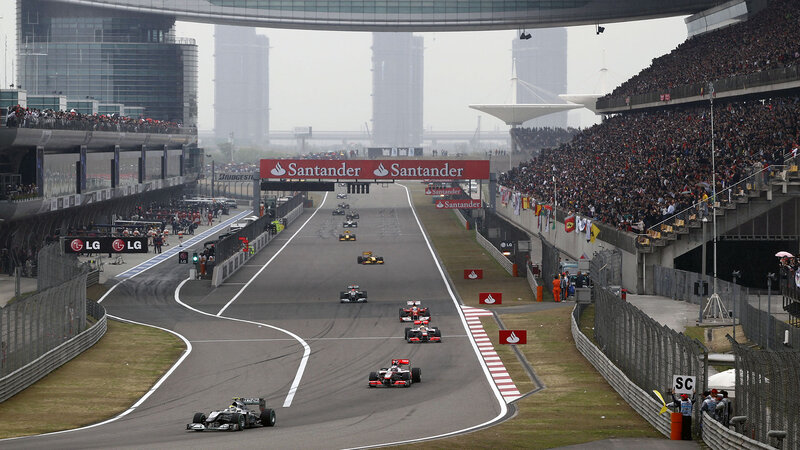 Formula One Cars on Track — Gray, Competitive, Afternoon