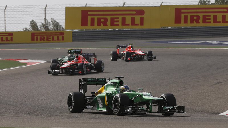 Formula One Cars on Track — Green, Competitive