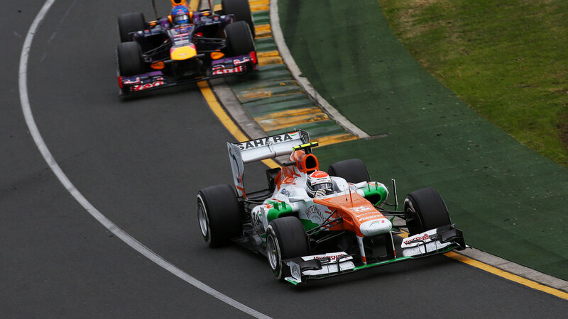 Formula One Cars on Track — Orange, Dynamic