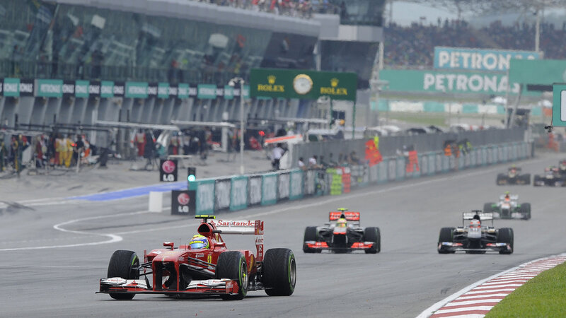 Formula One Cars on Track — Red, Competitive, Afternoon, Photograph
