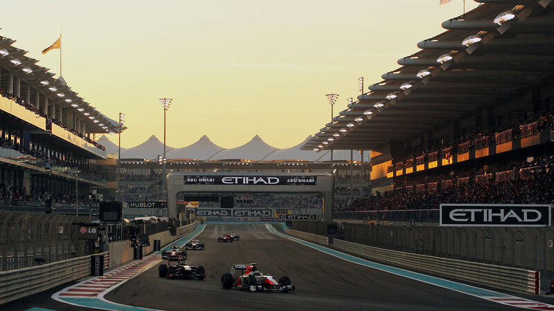 Formula One Cars on Track — Yellow, Dramatic