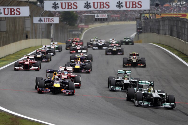 Formula One Cars Racing — Black, Competitive, Afternoon, Photograph, Racetrack