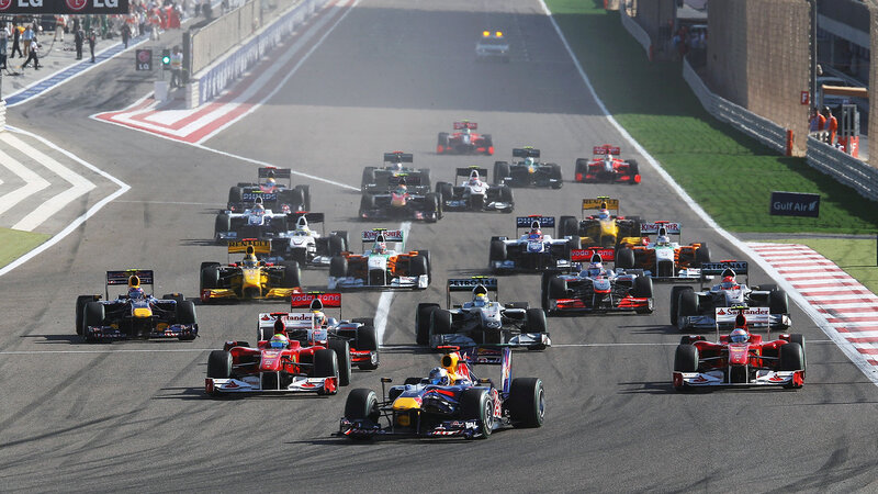 Formula One Cars Racing — Black, Dynamic, Afternoon, Photograph, Racetrack