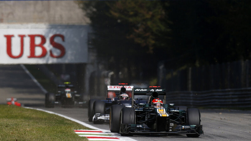 Formula One Cars Racing — Black, Dynamic, Afternoon, Photograph, Track