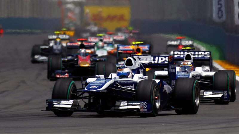 Formula One Cars Racing — Blue, Dynamic, Afternoon, Photograph, Race Track